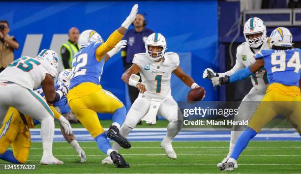 Miami Dolphins quarterback Tua Tagovailoa scrambles during the game against the Los Angeles Chargers in the second quarter at SoFi Stadium in...