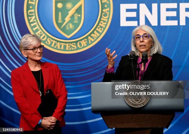 Energy Secretary Jennifer Granholm listens to Director of the White House Office of Science and Technology Policy Arati Prabhakar speak during a...