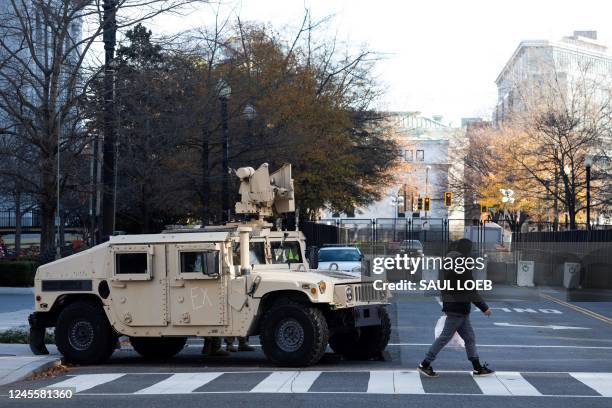 Members of the National Guard block the streets near the Walter E. Washington Convention Center, the site of the US-Africa Leaders Summit that brings...