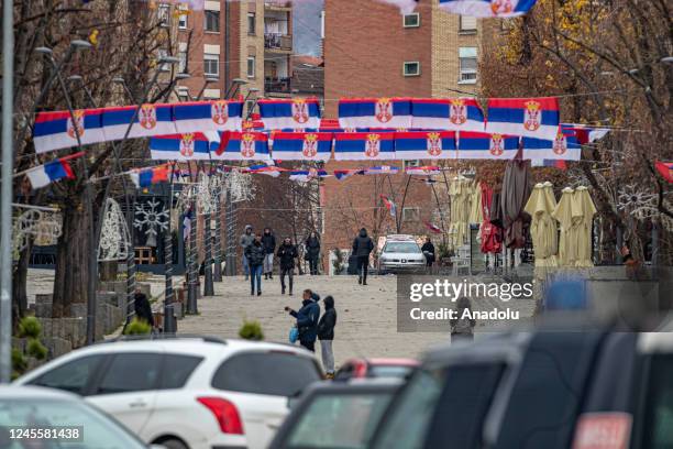 Latvian soldiers, serving on behalf of the NATO mission in Kosovo , patrol an area next to a roadblock set up by local Serbs near Ugljare Village, in...