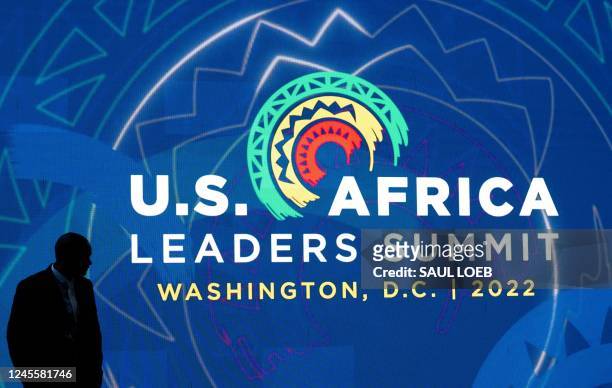 Attendees of the US - Africa Leaders Summit walk through the Walter E. Washington Convention Center, the site of the summit that brings together...