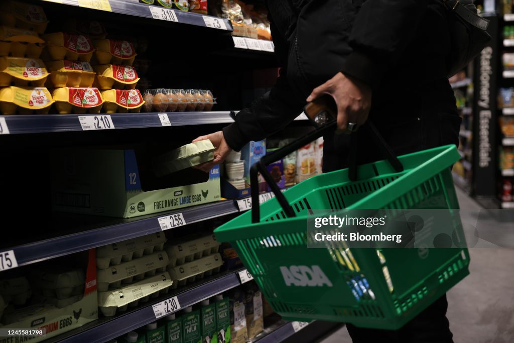 Asda Express Inside A shopper buys eggs at the Asda Express convenience store, operated ...