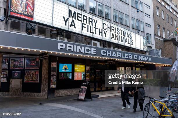 Merry Christmas Ya Filthy Animals sign outside the Prince Charles Cinema just off Leicester Square on 6th December 2022 in London, United Kingdom....