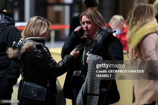 Caroline Villani , who lost a child and was injured during the 2016 attack in Nice, speaks on the phone on December 13, 2022 at the Paris courthouse...