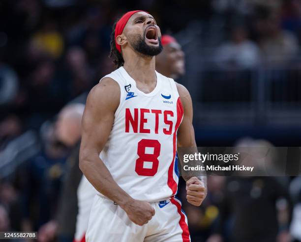 Patty Mills of the Brooklyn Nets reacts during the game against the Indiana Pacers at Gainbridge Fieldhouse on December 10, 2022 in Indianapolis,...