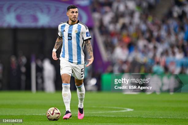 Leandro Paredes of Argentina runs with the ball during the Semi Final - FIFA World Cup Qatar 2022 match between Argentina and Croatia at the Lusail...