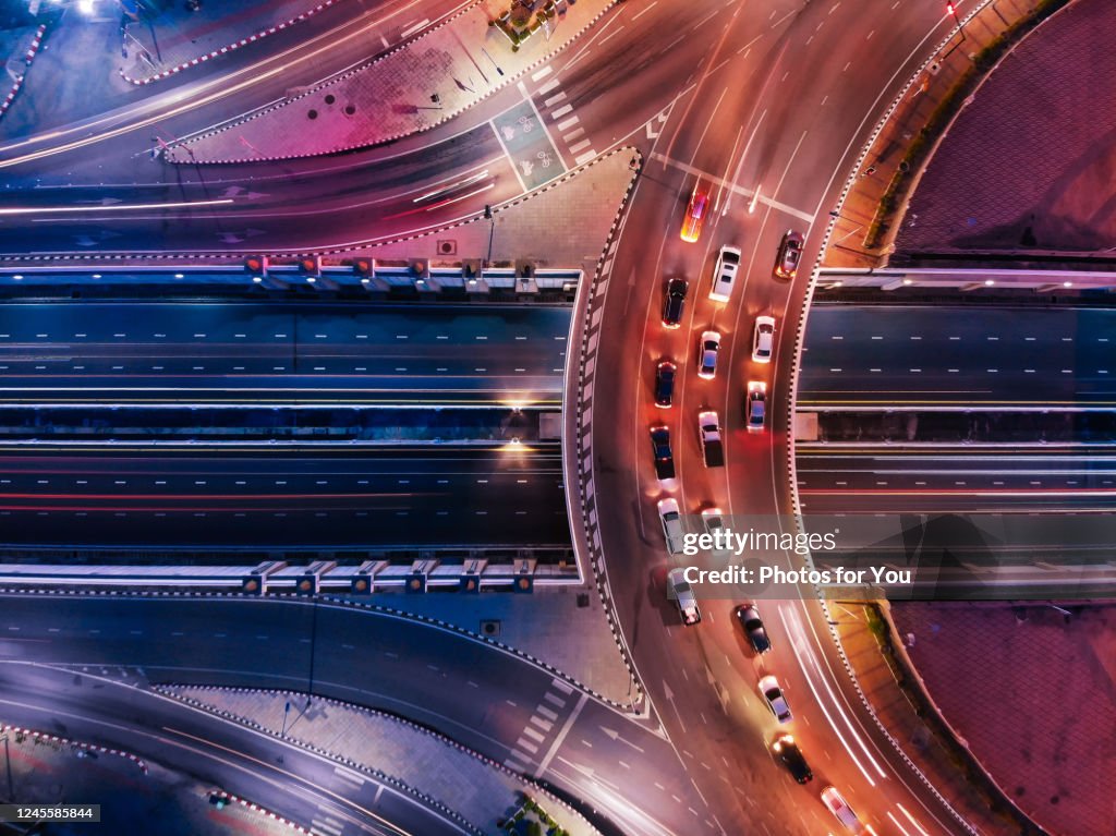 Aerial view/Circle roads and traffic at night