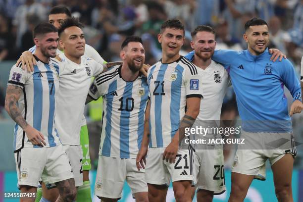 Argentina's midfielder Rodrigo De Paul, Argentina's forward Lautaro Martinez, Argentina's forward Lionel Messi, Argentina's forward Paulo Dybala,...