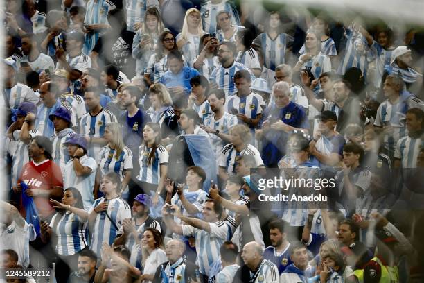 Fans of Argentina celebrate after the FIFA World Cup Qatar 2022 Semi-Final match between Argentina and Croatia at Lusail Stadium on December 13 in...