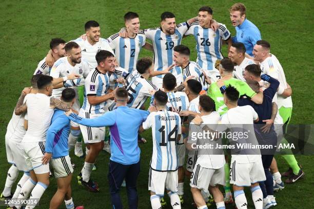 Argentina players celebrate at full time after qualifying for the FIFA World Cup final after the FIFA World Cup Qatar 2022 semi final match between...