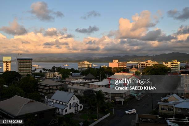 General view of the harbour front at sun rise in downtown Fijis capital city Suva on December 14, 2022.