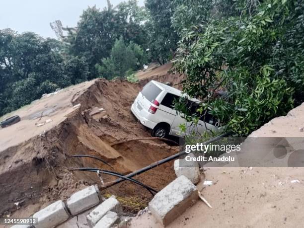 Damaged car is seen stuck after heavy rain cause flood in Kinsasha, Democratic Republic of the Congo on December 13, 2022. After two days of heavy...