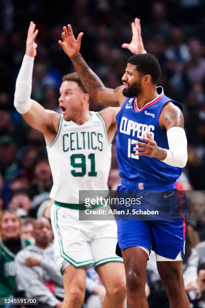 Los Angeles, CA Boston Celtics forward Blake Griffin, back, reacts after a technical foul is called on him as LA Clippers guard Paul George looks for...