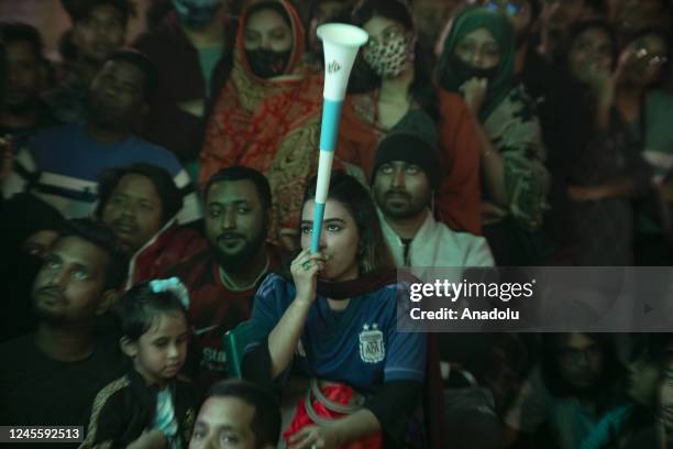 Bangladeshi football fans watch the live broadcast of the FIFA World Cup Qatar 2022 Semi-Final match between Argentina and Croatia on a big screen at...