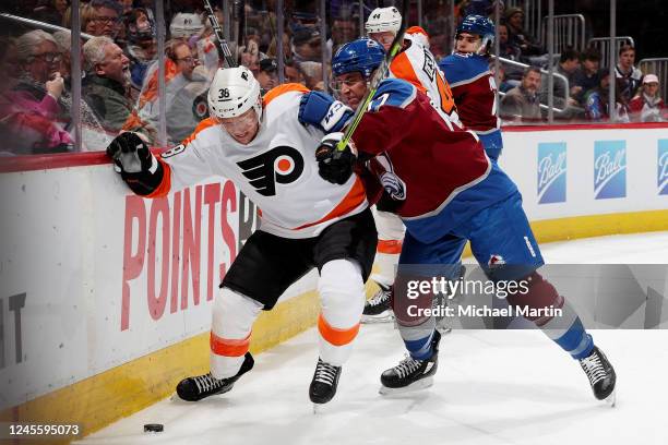 Patrick Brown of the Philadelphia Flyers skates against Brad Hunt of the Colorado Avalanche at Ball Arena on December 13, 2022 in Denver, Colorado.