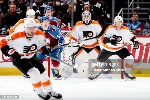 Goaltender Felix Sandstrom and Lukas Sedlak of the Philadelphia Flyers defend against the Colorado Avalanche at Ball Arena on December 13, 2022 in...