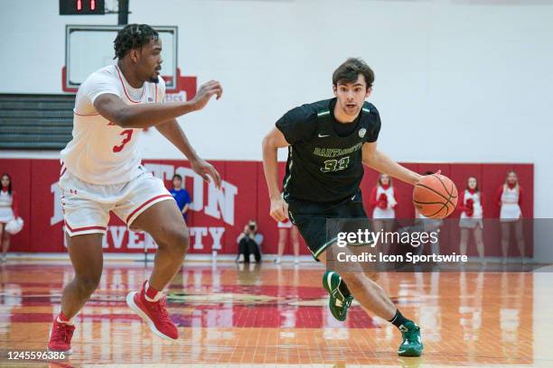 Dartmouth Big Green forward Jackson Munro drives to the basket during a college basketball game between the Dartmouth Big Green and the Boston...