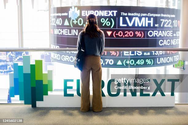 Visitor looks out over a trading floor from a balcony inside the Euronext NV stock exchange in Paris, France, on Wednesday, Dec. 14, 2022. Paris is...