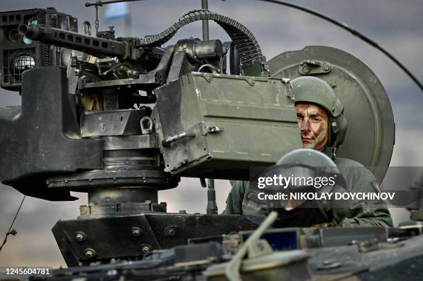Italian Army troops, take part in the joint military exercise "Strike Back" at the Novo Selo military ground, northwestern Bulgaria, on December 14,...
