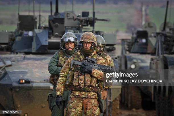 Italian Army troops, take part in the joint military exercise "Strike Back" at the Novo Selo military ground, northwestern Bulgaria, on December 14,...