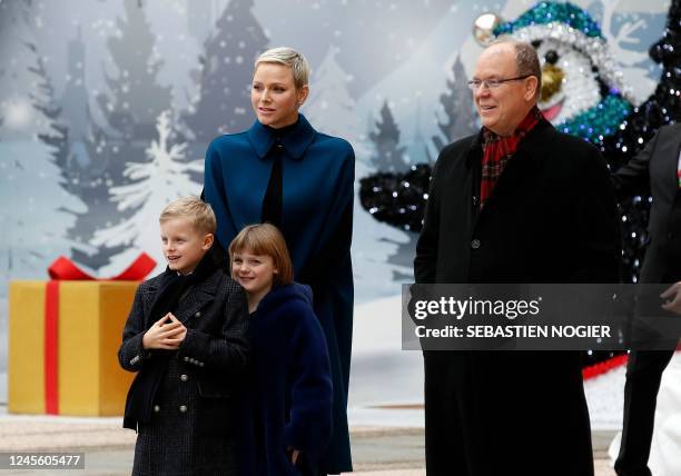 Prince Albert II of Monaco , Princess Charlene of Monaco , Prince Jacques and Princess Gabriella attend the inauguration of the traditional Christmas...