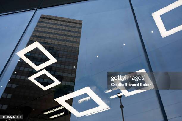 Repeating squares are seen in a corporate atrium space with an office high-rise tower in the City of London, the capital's 'Square Mile' financial...