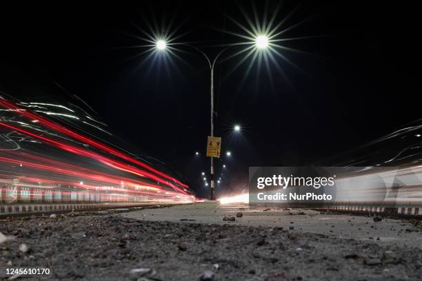 Street lights illuminate as vehicles move over Tawi bridge in Jammu City Jammu and Kashmir India on 14 December 2022