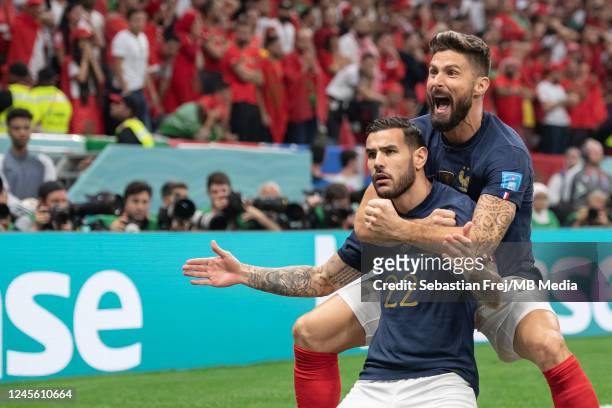 Theo Hernandez of France celebrates scoring the opening goal with Olivier Giroud of France during the FIFA World Cup Qatar 2022 semi final match...