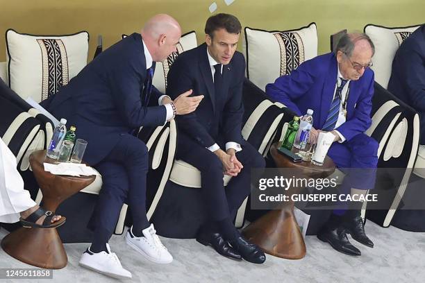 President Gianni Infantino, French President Emmanuel Macron and the president of the French Football Federation, Noel Le Graet, attend the Qatar...