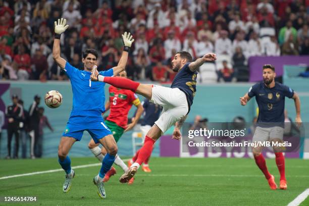 Theo Hernandez of France scores the opening goal past Yassine Bounou of Morocco during the FIFA World Cup Qatar 2022 semi final match between France...