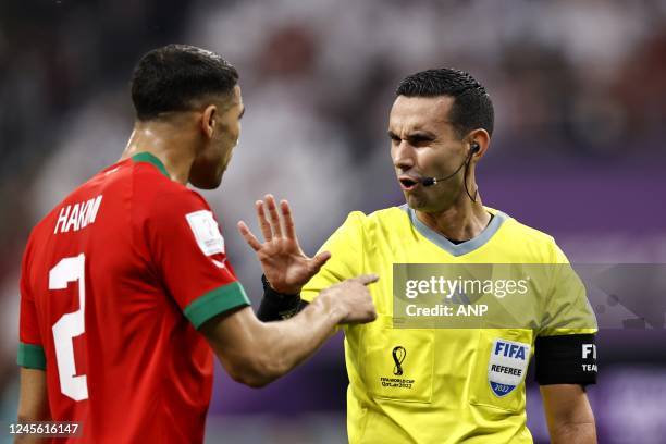 Achraf Hakimi of Morocco, Referee Cesar Arturo Ramos Palazuelos during the FIFA World Cup Qatar 2022 Semifinal match between France and Morocco at Al...