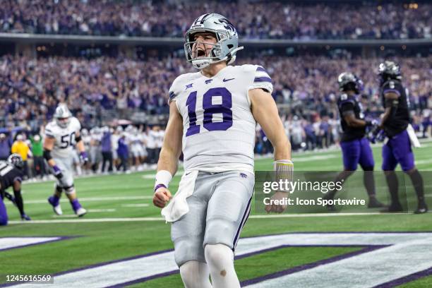 Kansas State Wildcats quarterback Will Howard runs into the end zone for a touchdown during the Big 12 Championship game between the Kansas State...