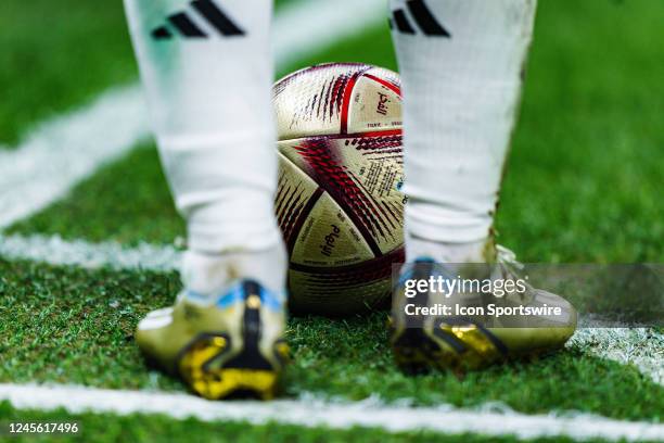 Close up of the official match ball of the semifinals and finals in between the feet of Argentina forward Lionel Messi during the Semifinal match of...