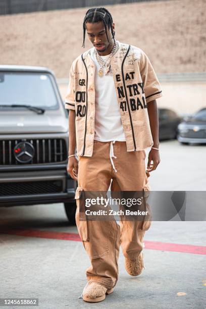 Shai Gilgeous-Alexander of the Oklahoma City Thunder arrives to the arena before the game against the Miami Heat on December 14, 2022 at Paycom Arena...