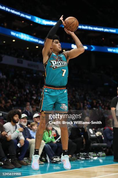 Killian Hayes of the Detroit Pistons shoots a three point basket during the game against the Charlotte Hornets on December 14, 2022 at Spectrum...