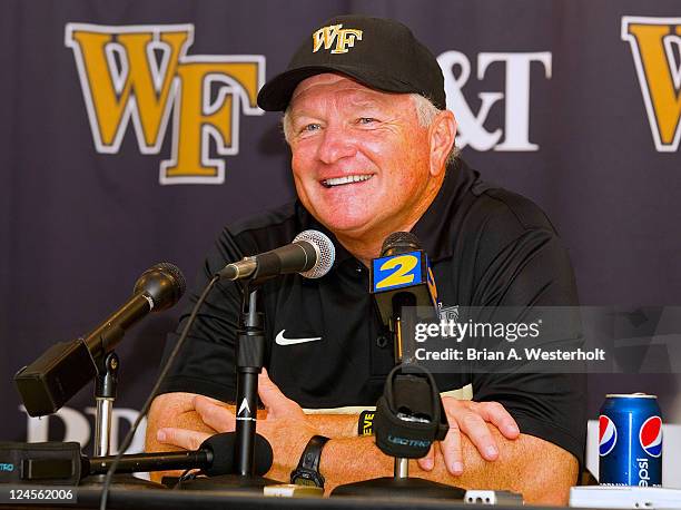 Wake Forest Demon Deacons head coach Jim Grobe smiles as he answers questions following the game against the North Carolina State Wolfpack at BB&T...