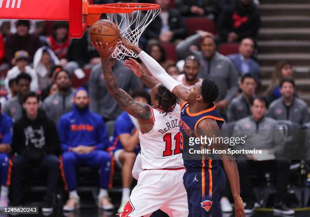 New York Knicks Forward RJ Barrett blocks Chicago Bulls Forward DeMar DeRozan lay up during a NBA game between the New York Knicks and the Chicago...