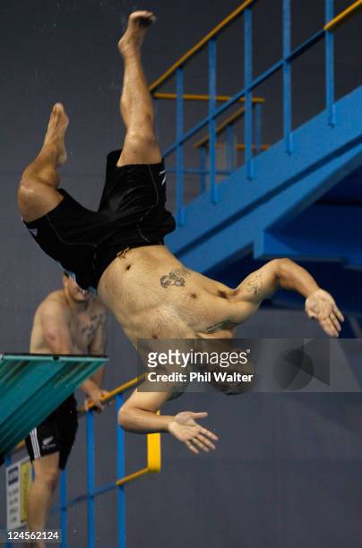 John Afoa of the All Blacks dives during a New Zealand All Blacks IRB Rugby World Cup 2011 recovery session at the Waterworld Aquatic Centre on...