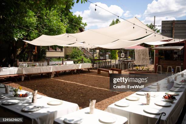 high wide angle view of wedding tables set up, no people - wedding venue stock pictures, royalty-free photos & images