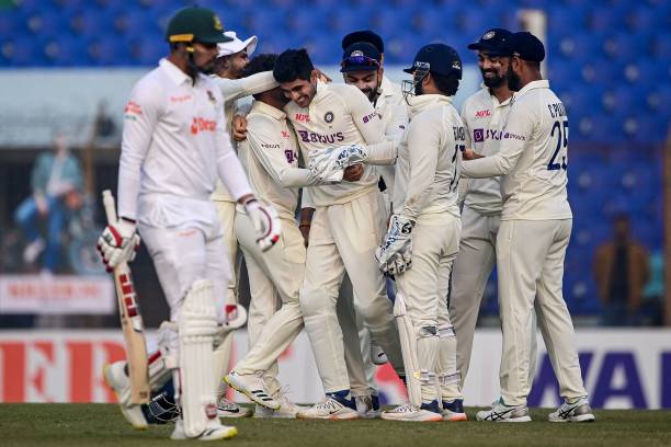 India's cricketers celebrate after the dismissal of Bangladesh's Nurul Hasan during the second day of the first cricket Test match between Bangladesh...