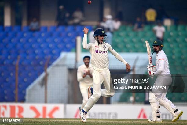India's Shubman Gill celebrates after the dismissal of Bangladesh's Nurul Hasan during the second day of the first cricket Test match between...