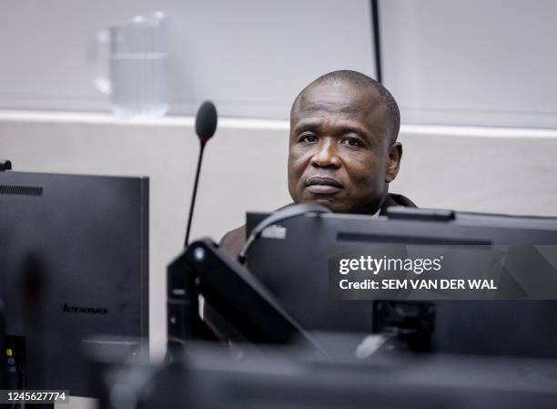 Ugandan former child soldier Dominic Ongwen looks on prior to the ruling in the appeal at the International Criminal Court, in The Hague on December...