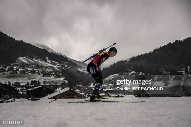 Norwegian biathlete Johannes Thingnes Boe competes to win in the mens 10 km sprint event of the IBU Biathlon World Cup in Le Grand Bornand near...