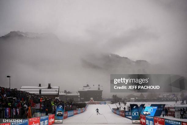 Biathlete Paul Schommer takes part in the zeroing session in front supporters prior to the mens 10 km sprint event of the IBU Biathlon World Cup in...