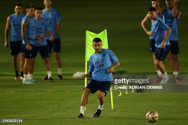 Argentina's midfielder Leandro Paredes takes part in a training session at the Qatar University training site 3 in Doha on December 15, 2022. -...
