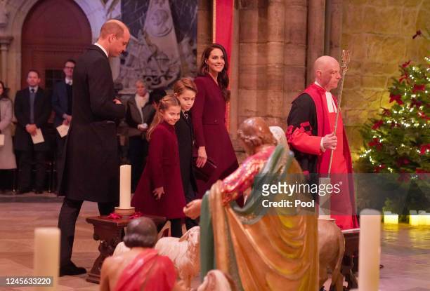 Prince William, Prince of Wales, Catherine, Princess of Wales, Prince George and Princess Charlotte attend the 'Together at Christmas' Carol Service...