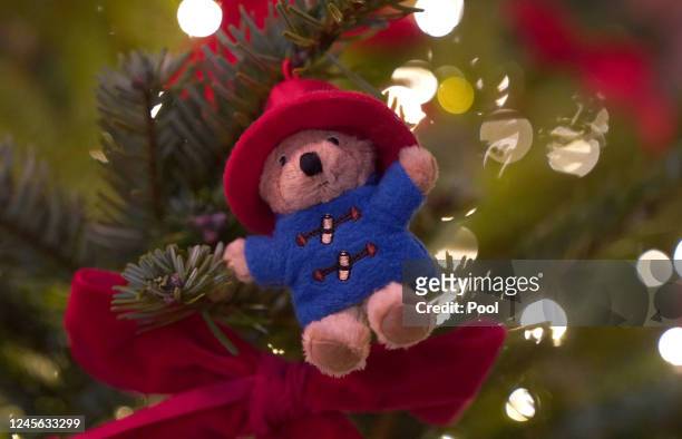 Paddington Bear ornaments on a Christmas Tree during the 'Together at Christmas' Carol Service at Westminster Abbey on December 15, 2022 in London,...