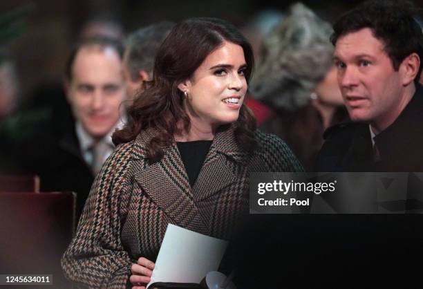 Princess Eugenie and Jack Brooksbank arrive for the 'Together at Christmas' Carol Service at Westminster Abbey on December 15, 2022 in London,...