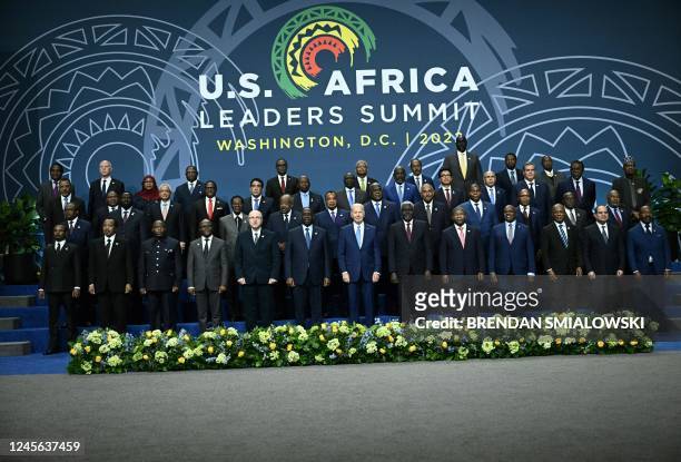 President Joe Biden participates in a family photo with the leaders of the US-Africa Leaders Summit at the Walter E. Washington Convention Center in...