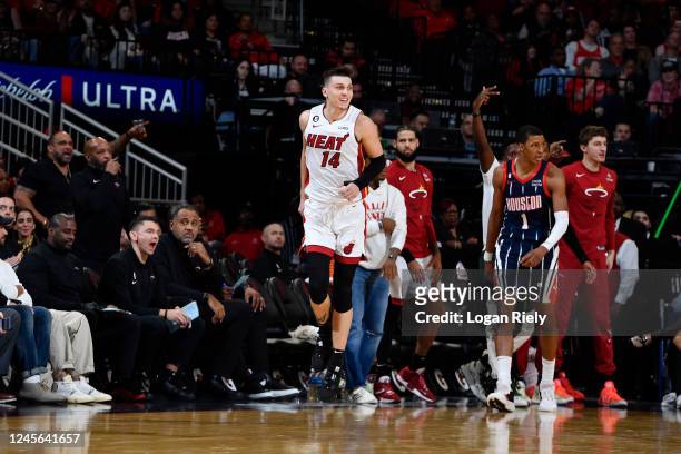Tyler Herro of the Miami Heat smiles during the game against the Houston Rockets on December 15, 2022 at the Toyota Center in Houston, Texas. NOTE TO...
